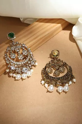 Kundan chandbali earrings with emerald stones