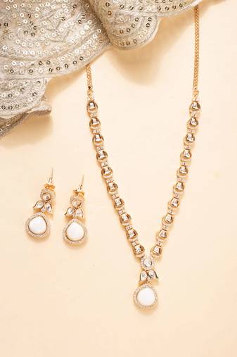 Gold-plated necklace with raindrop-shaped white pendant & matching earrings