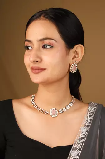 Gold-plated flower pendant necklace with pastel pink stone & matching earrings