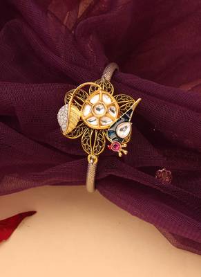 Silver peacock bracelet with floral accents 4