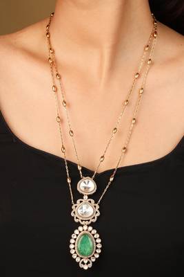 Elegant green and white stone pendant necklace with detailed accents 4