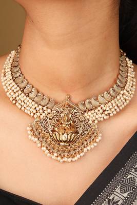 Elegant white bead necklace with gold-plated lakshmi motif pendant 4