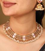Contemporary gold-plated necklace with arranged lines & stone accents