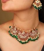 Moon-shaped pendant necklace with dark green jhumkis & matching earrings