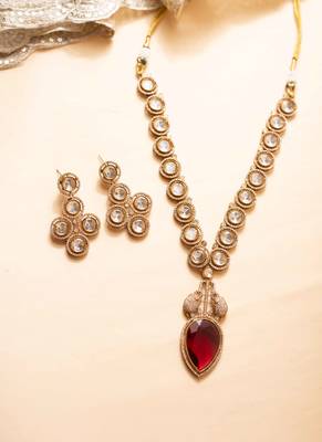 Kundan necklace with red leaf-shaped stone pendant and elephant motif 1