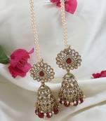 traditional kundan & pearl jhumka earrings with attachable ear chain for women 