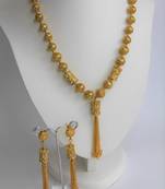 Elegant gold filigree tassel necklace and earring set - traditional indian bridal jewelry