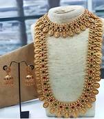 Exquisite gold-plated temple jewelry set with ruby and emerald accents