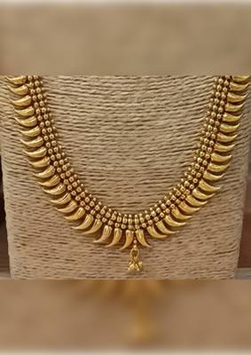 Traditional gold-plated kerala mullamottu mala set with jhumka earrings 2