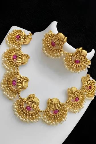 Exquisite elephant motif gold necklace set with pearl accents - traditional indian jewelry"