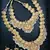 Gold-plated traditional goddess lakshmi temple jewellery bridal set with ruby stone long haram double Necklace :: set
