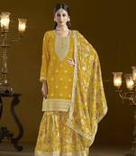 Yellow embroidered silk semi stitched sharara suit