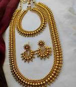 Traditional gold-plated kolhapuri saaj necklace set with matching earrings