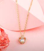  gold-toned heart-shaped necklace with sparkling cubic zirconia and light whitestone center
