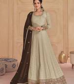 Beige embroidered georgette free size upto 44 size anarkali with dupatta
