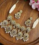 Elegant kundan choker necklace set with big pendant, pearls & gold polish     bridal set with matching earrings
