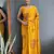 ready to wear mustard faux georgette hand printed saree
