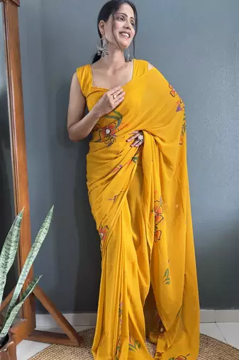 pre draped mustard faux georgette hand printed saree
