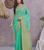Sea green ethnic linen c graceful festive saree with wevon jacquard designer
