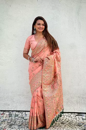 Graceful and ethnic peach wevon kashmiri meenakari trendy partywear saree