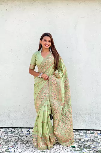 Graceful and ethnic pista wevon kashmiri meenakari trendy partywear saree