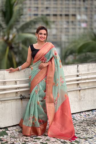 Sea green crush tissue c glamorous wevon designer saree with floral printed body