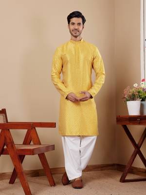Beautiful chikankari embroidery work yellow viscosee fabric partywear kurta payjama 1