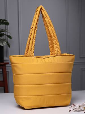 uno saffron yellow polyester striped quilted handheld bag 1