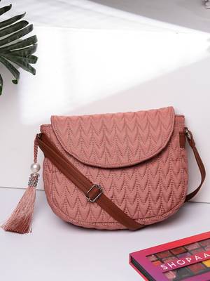 uno coral & tan polyester & vegan leather chevron quilted sling bag 1