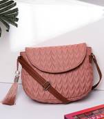 uno coral & tan polyester & vegan leather chevron quilted sling bag