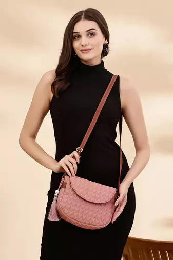 uno coral & tan polyester & vegan leather chevron quilted sling bag