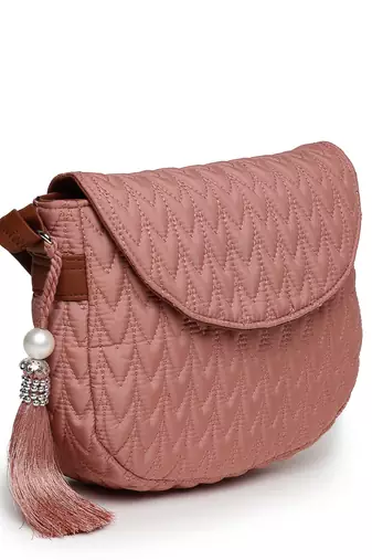uno coral & tan polyester & vegan leather chevron quilted sling bag