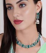 silver-plated ruby pink stone studded & beaded oxidised jewellery set