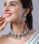 silver-plated green stone studded & beaded oxidised jewellery set