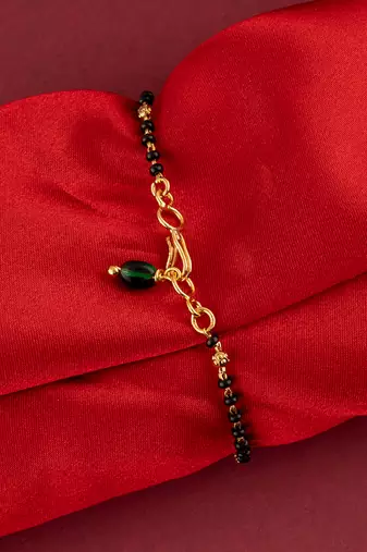 Black beads bracelet with emerald bead hangings one gram gold