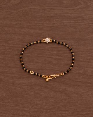 Black bead bracelet with diamond flower one gram gold 2