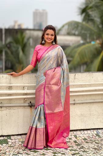 Grey traditional kanjivaram tissue silk saree with zari work and contrast blouse