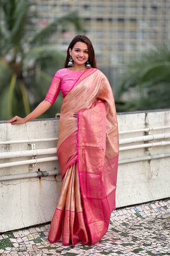 Peach traditional kanjivaram tissue silk saree with zari work and contrast blouse