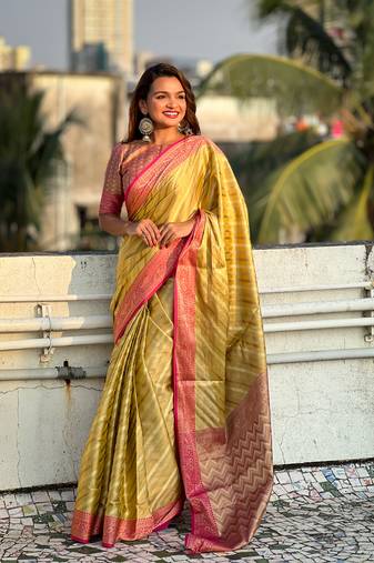 Light green pure soft zari tissue leheriya saree with contrast blouse