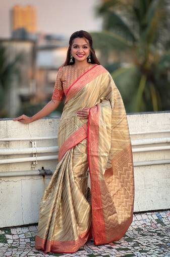 Cream pure soft zari tissue leheriya saree with contrast blouse