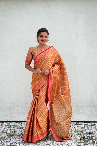 Orange pure soft zari tissue leheriya saree with contrast blouse