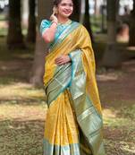 Yellow kanjivaram pattu traditional saree with zari weaves and contrast blouse