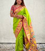 Green traditional rajhans paithani silk saree with contrast blouse
