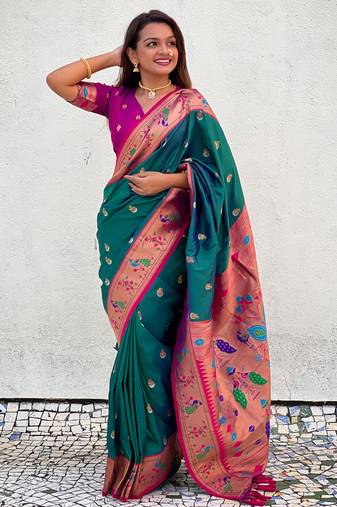 Dark green traditional rajhans paithani silk saree with contrast blouse