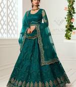 teal green net embroidered wedding lehenga