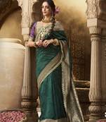 Green designer weaving soft banarasi silk blend saree with designer blouse