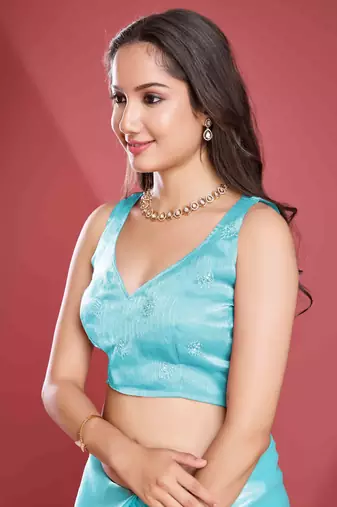 sky blue soft tissue embroidered saree with unstitched blouse piece