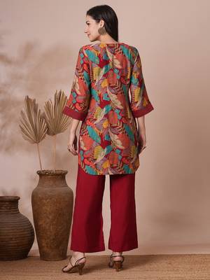 Printed center pleated co-ord set with stitchlines on neck and cuff with tassel detailing, paired with palazzo. 2