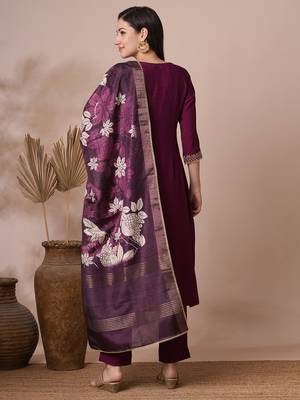 Embroidered a line silk blend kurta paired with printed dupatta and lined pants. 2