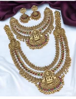 Grand temple design gold bridal necklace set with lakshmi motif and multi-color stones 1